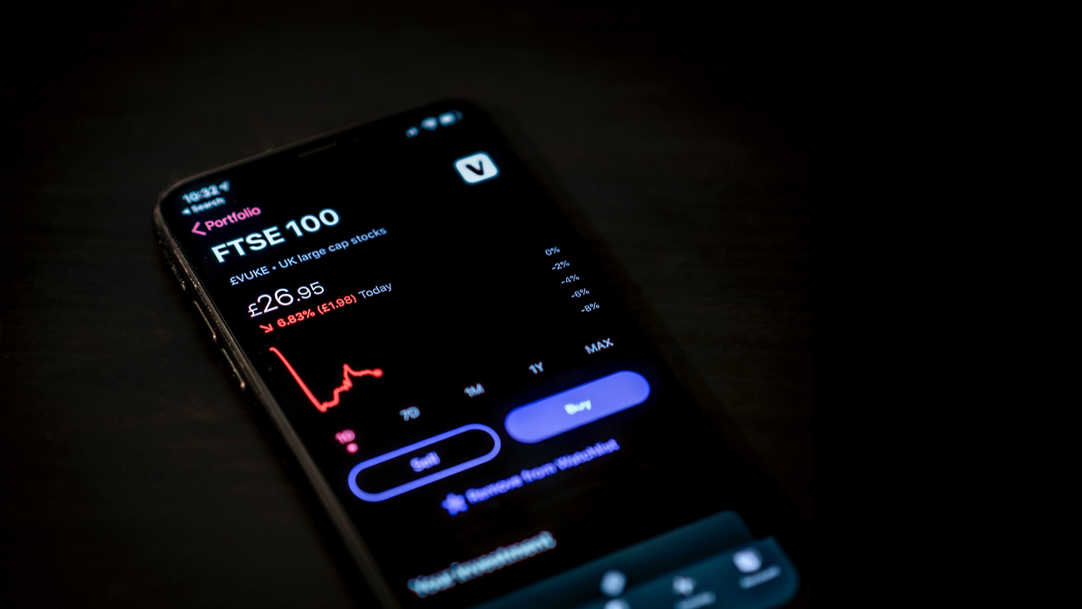 iPhone con grafico azionario